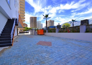 شقة غرفتين وصالة - ضمن مجمع سكني - قريب من البحر والخدمات - في مهموتلار / الانيا