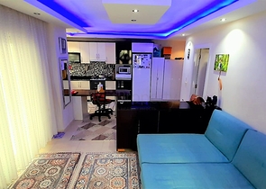 شقة غرفة وصالة - مناسبة للاستثمار او العطلات - ضمن مجمع في منطقة مهموتلار / الانيا 