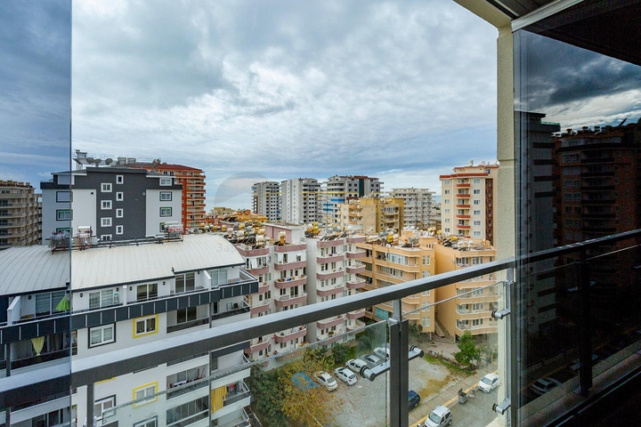 مساحة واسعة -طابق مرتفع - شقة غرفتين وصالة مفروشة -ضمن مجمع في مهموتلار / الانيا 