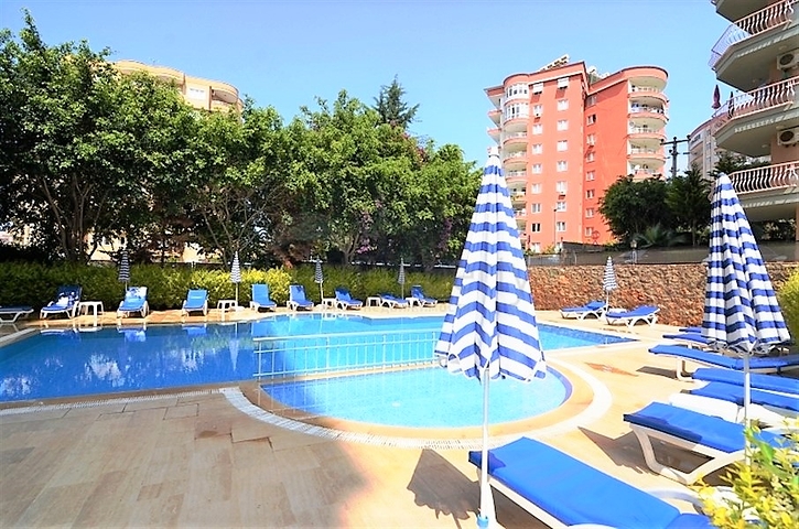 شقة 2 غرفتين وصالة - مفروشة -ضمن مجمع سكني - في منطقة توسمور المركزية / الانيا 