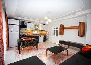 شقة 2 غرفتين وصالة - مفروشة -ضمن مجمع سكني - في منطقة توسمور المركزية / الانيا 