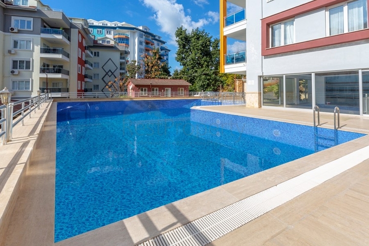 شقة 2 غرفة وصالة -ضمن مجمع سكني حديث -في توسمور / الانيا 