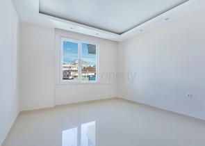 شقة 2 غرفة وصالة -ضمن مجمع سكني حديث -في توسمور / الانيا 