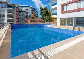 شقة 2 غرفة وصالة -ضمن مجمع سكني حديث -في توسمور / الانيا 