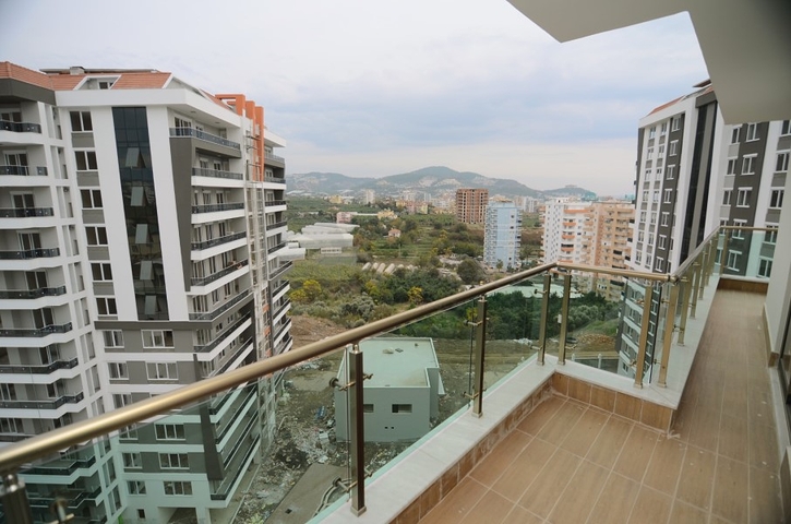 شقق ضمن مجمع فاخر - تصميم 1+1 - في مهموتلار / الانيا