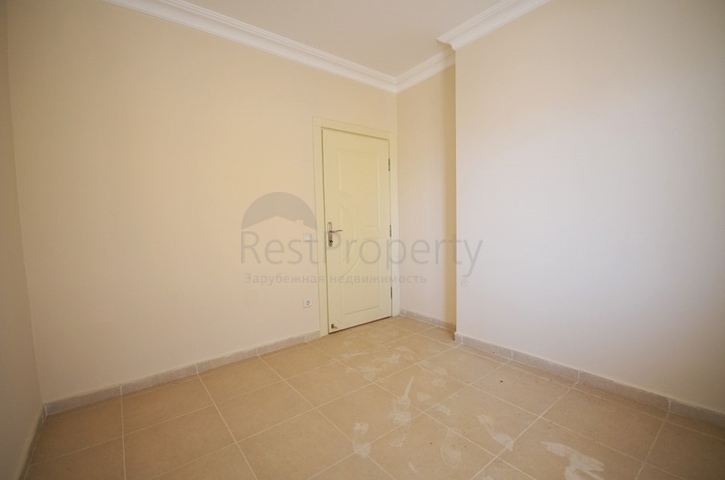 شقة 2 غرفة وصالة - ضمن مجمع سكني -في مهموتلار / الانيا 