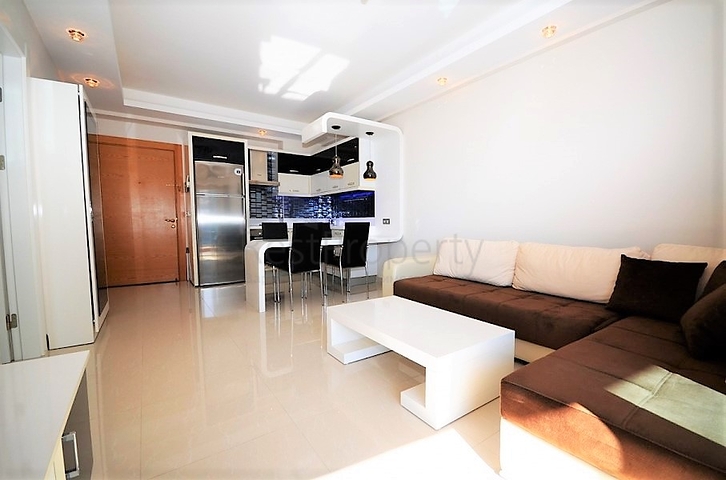 اطلالة بحر - شقة ضمن مجمع فاخر يضم كافة الخدمات - تصميم 1+1 - في مهموتلار / الانيا 