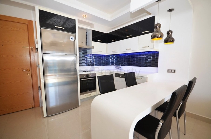 اطلالة بحر - شقة ضمن مجمع فاخر يضم كافة الخدمات - تصميم 1+1 - في مهموتلار / الانيا 