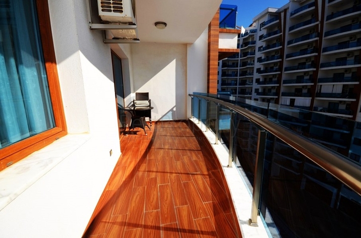 اطلالة بحر - شقة ضمن مجمع فاخر يضم كافة الخدمات - تصميم 1+1 - في مهموتلار / الانيا 