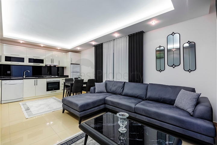 قريبة من شاطئ كليوباترا - شقة 1+1 - بالكون واسع - مجمع متكامل -في مركز الانيا 