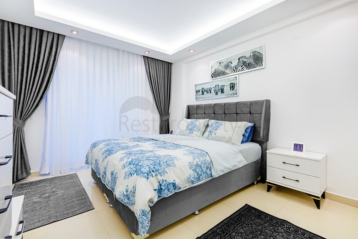 قريبة من شاطئ كليوباترا - شقة 1+1 - بالكون واسع - مجمع متكامل -في مركز الانيا 