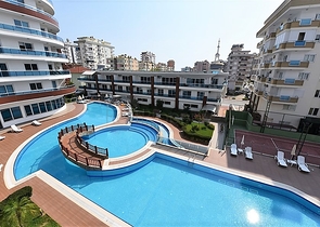 ضمن مجمع سكني حديث - شقة غرفة وصالة - مفروشة - في مهموتلار / الانيا 