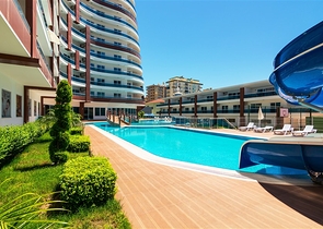 ضمن مجمع سكني حديث - شقة غرفة وصالة - مفروشة - في مهموتلار / الانيا 