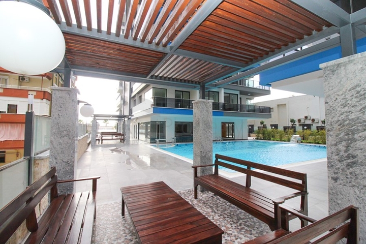 مجمع فاخر - ضمن اول صف على البحر - شقة 1+1 - في مهموتلار / الانيا 