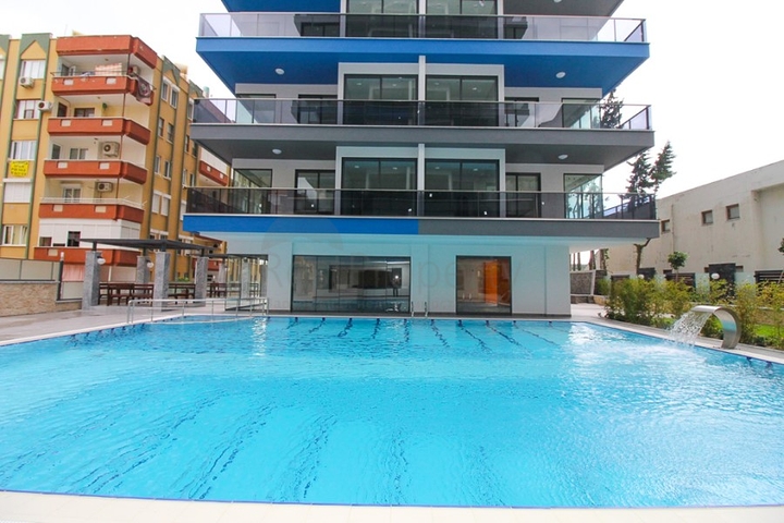 مجمع فاخر - ضمن اول صف على البحر - شقة 1+1 - في مهموتلار / الانيا 