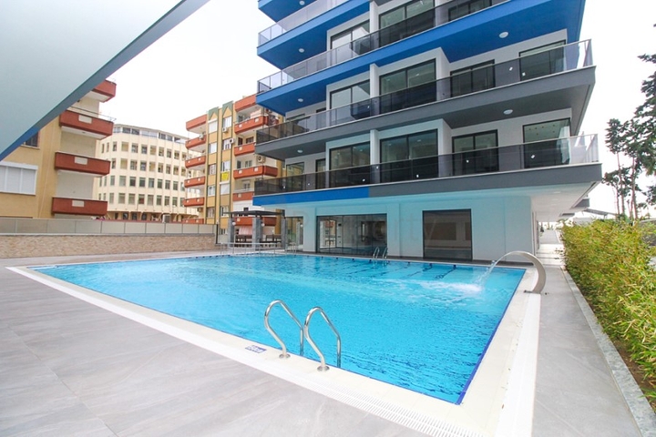 مجمع فاخر - ضمن اول صف على البحر - شقة 1+1 - في مهموتلار / الانيا 