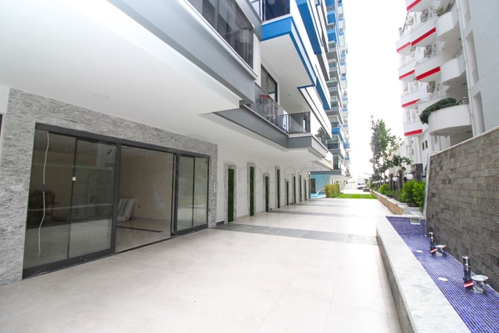 مجمع فاخر - ضمن اول صف على البحر - شقة 1+1 - في مهموتلار / الانيا 