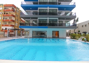 مجمع فاخر - ضمن اول صف على البحر - شقة 1+1 - في مهموتلار / الانيا 