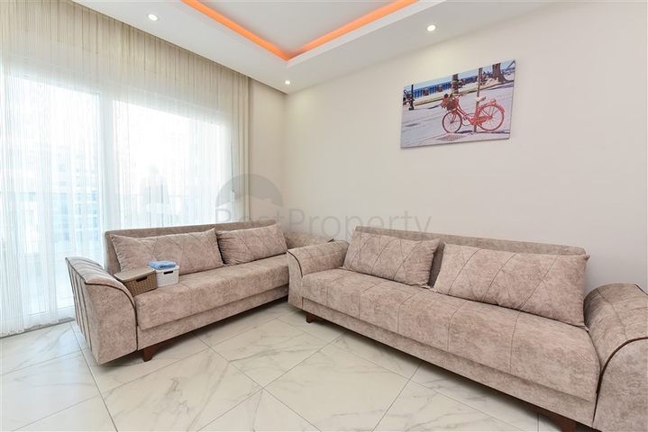 شقة غرفة وصالة مفروشة - بالكون مغلق - ضمن مجمع - في مهموتلار / الانيا 