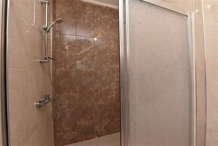 شقة غرفة وصالة مفروشة - بالكون مغلق - ضمن مجمع - في مهموتلار / الانيا 