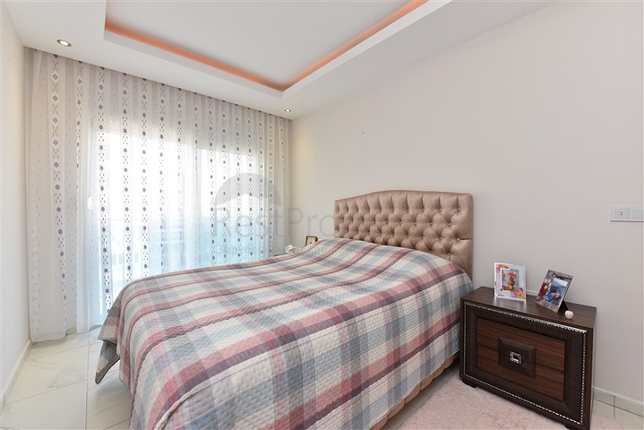 شقة غرفة وصالة مفروشة - بالكون مغلق - ضمن مجمع - في مهموتلار / الانيا 