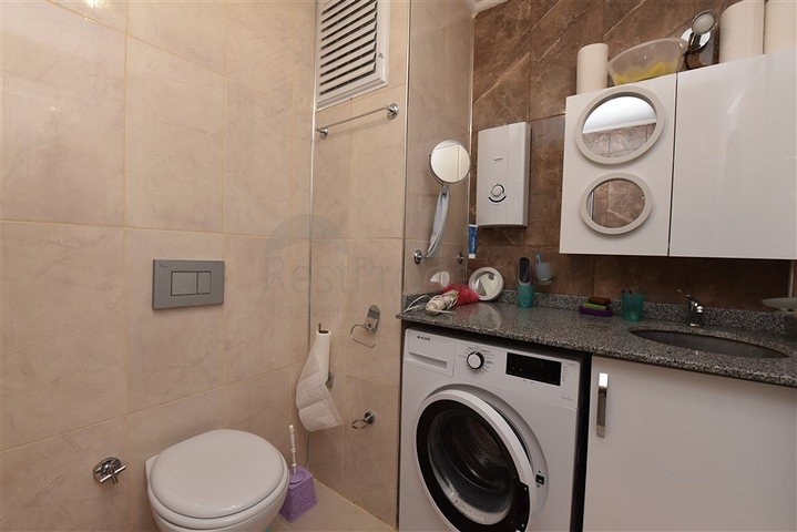 شقة غرفة وصالة مفروشة - بالكون مغلق - ضمن مجمع - في مهموتلار / الانيا 