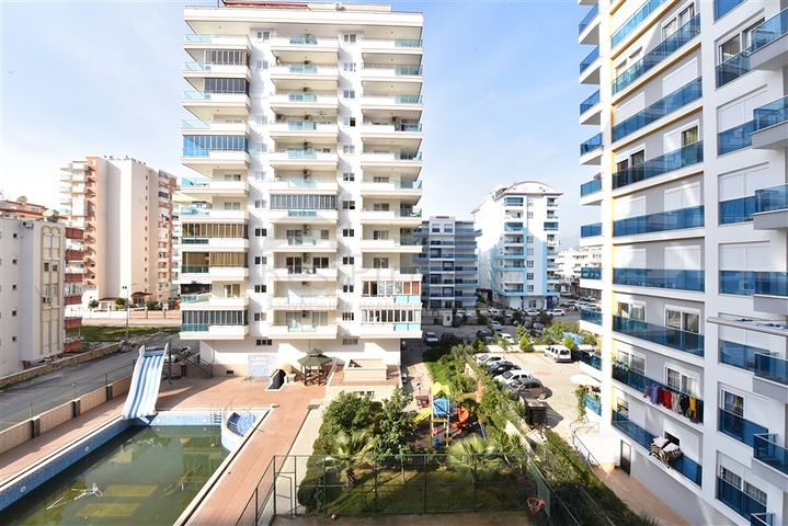 شقة غرفة وصالة مفروشة - بالكون مغلق - ضمن مجمع - في مهموتلار / الانيا 