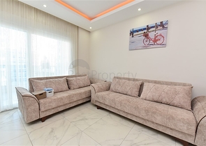 شقة غرفة وصالة مفروشة - بالكون مغلق - ضمن مجمع - في مهموتلار / الانيا 