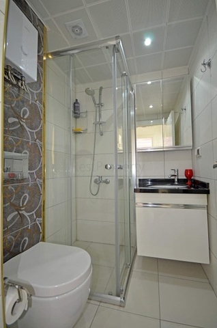 تراس واسع- شقة في مركز المدينة - تصميم 1+1- الانيا 