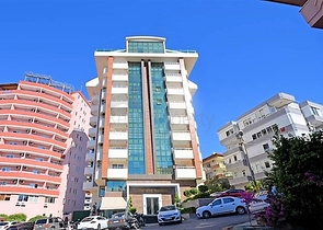 تراس واسع- شقة في مركز المدينة - تصميم 1+1- الانيا 