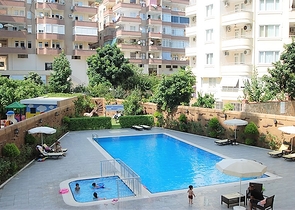 تراس واسع- شقة في مركز المدينة - تصميم 1+1- الانيا 