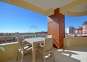 تراس واسع- شقة في مركز المدينة - تصميم 1+1- الانيا 