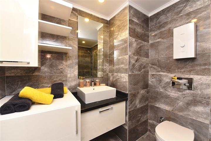 شقة غرفة وصالة -طابق مرتفع - اثاث جديد - في مهموتلار / الانيا 