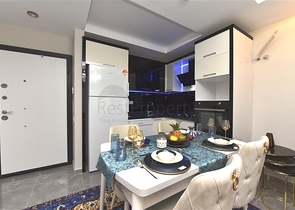 شقة غرفة وصالة -طابق مرتفع - اثاث جديد - في مهموتلار / الانيا 