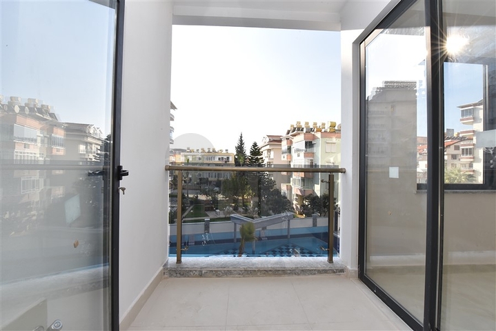 شقة 2 غرفة وصالة -ضمن مجمع سكني حديث -في مركز الانيا 