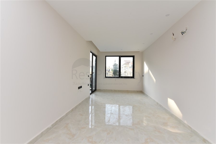 شقة 2 غرفة وصالة -ضمن مجمع سكني حديث -في مركز الانيا 