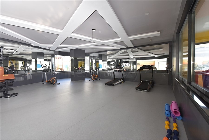 شقة 2 غرفة وصالة -ضمن مجمع سكني حديث -في مركز الانيا 