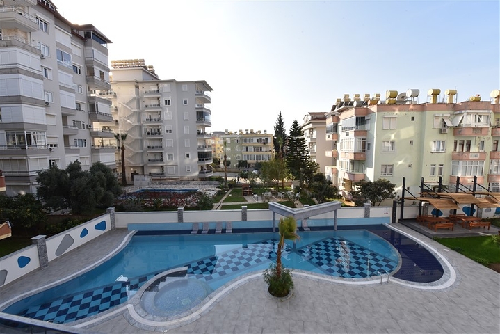 شقة 2 غرفة وصالة -ضمن مجمع سكني حديث -في مركز الانيا 