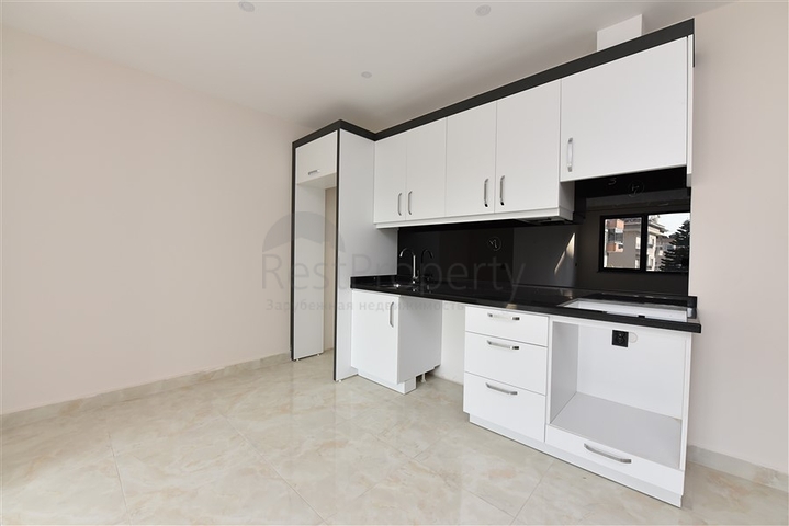 شقة 2 غرفة وصالة -ضمن مجمع سكني حديث -في مركز الانيا 