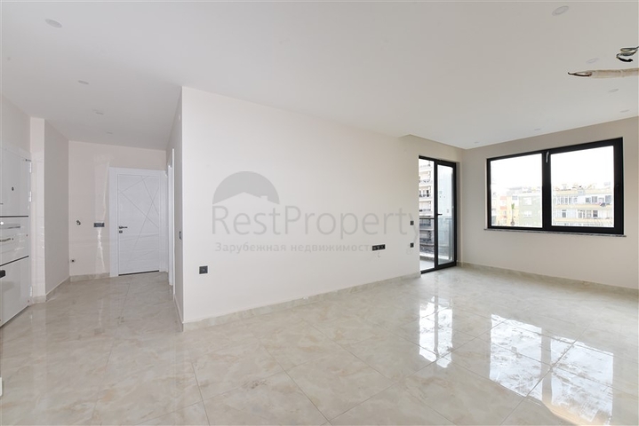 شقة 2 غرفة وصالة -ضمن مجمع سكني حديث -في مركز الانيا 