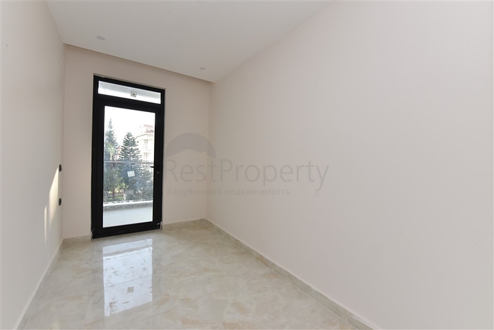 شقة 2 غرفة وصالة -ضمن مجمع سكني حديث -في مركز الانيا 