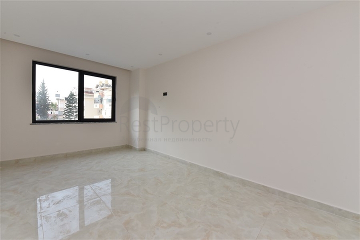 شقة 2 غرفة وصالة -ضمن مجمع سكني حديث -في مركز الانيا 