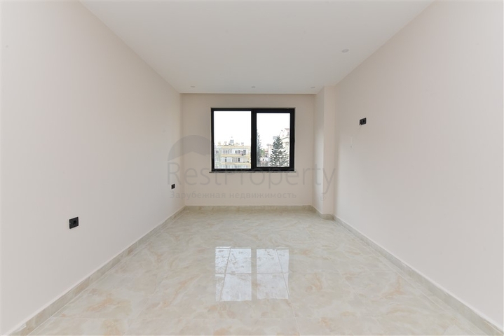 شقة 2 غرفة وصالة -ضمن مجمع سكني حديث -في مركز الانيا 