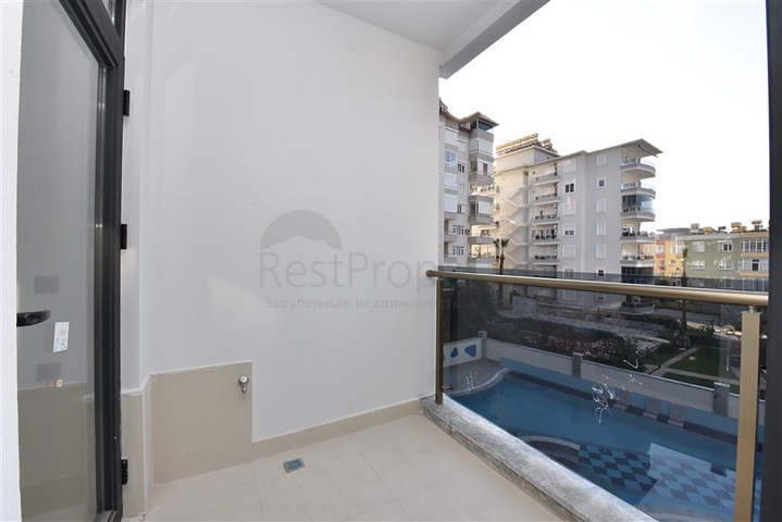 شقة 2 غرفة وصالة -ضمن مجمع سكني حديث -في مركز الانيا 