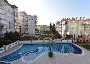 شقة 2 غرفة وصالة -ضمن مجمع سكني حديث -في مركز الانيا 