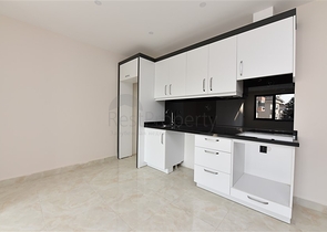 شقة 2 غرفة وصالة -ضمن مجمع سكني حديث -في مركز الانيا 