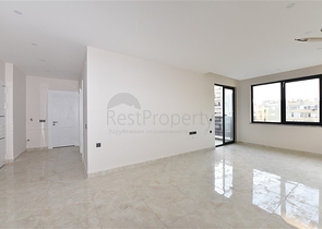 شقة 2 غرفة وصالة -ضمن مجمع سكني حديث -في مركز الانيا 