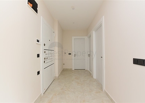 شقة 2 غرفة وصالة -ضمن مجمع سكني حديث -في مركز الانيا 