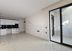 شقة 2 غرفة وصالة -ضمن مجمع سكني حديث -في مركز الانيا 