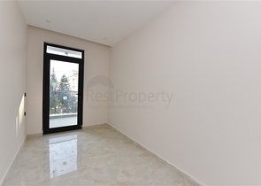 شقة 2 غرفة وصالة -ضمن مجمع سكني حديث -في مركز الانيا 